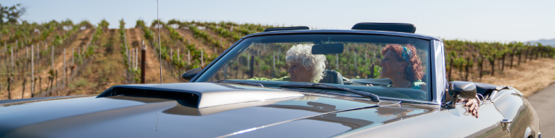 Older women in car near wineries