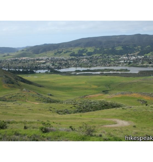 panned image of laguna lake, with dark green hills