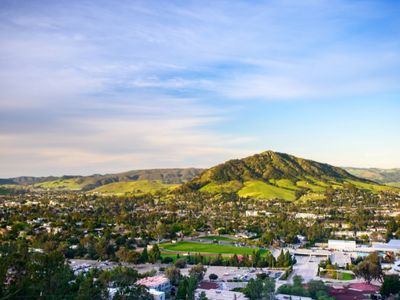 Cal Poly with green hills in the background, photo by Brittany App