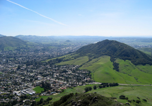 aerial image of SLO and green hills 