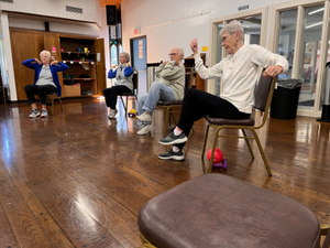 Seniors exercising during Chair exercise class