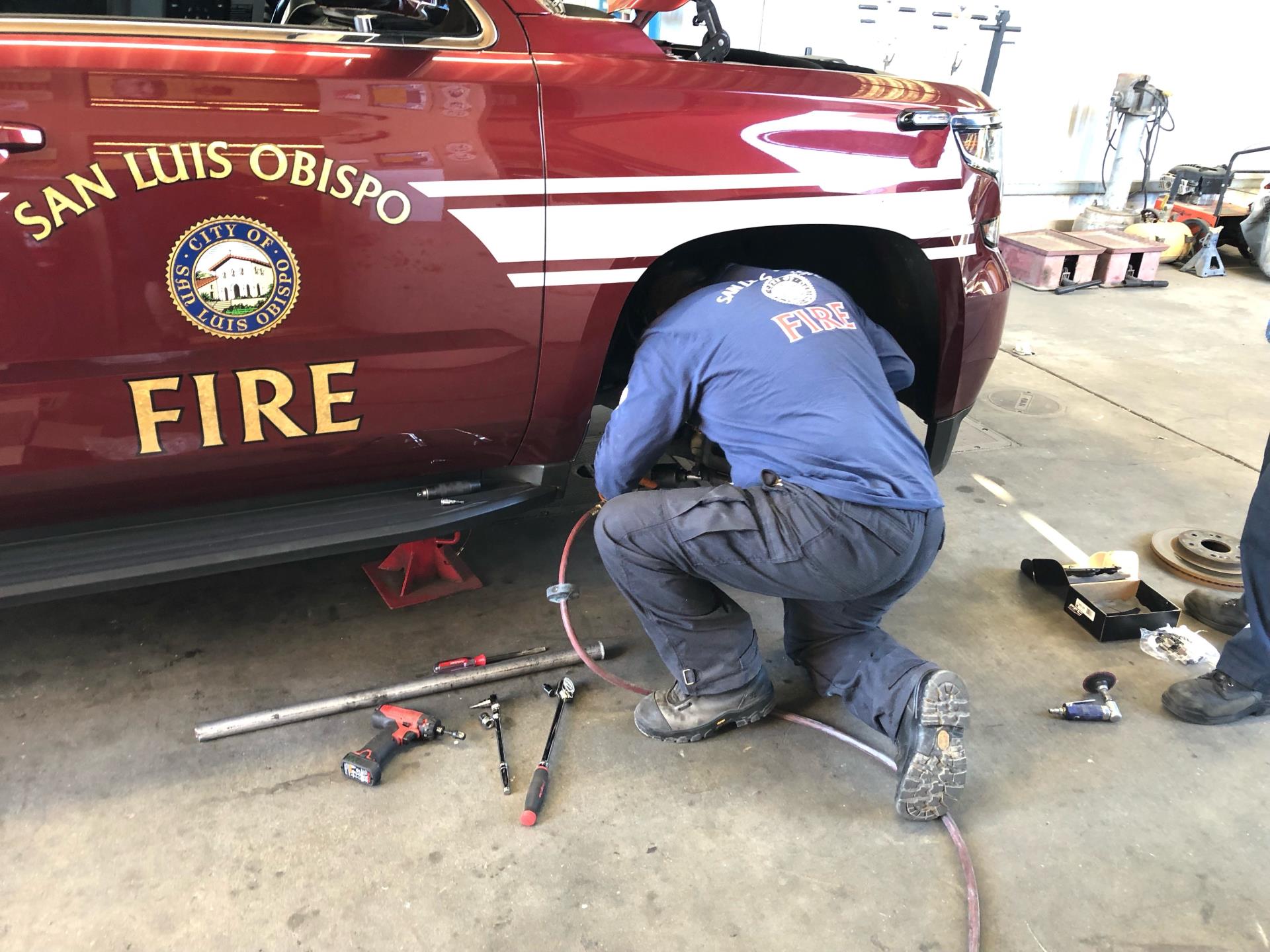 Picture of Mechanic Working on Fire Vehicle