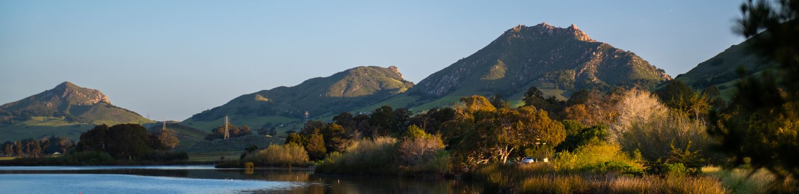 Laguna Lake with dark green mountains