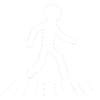 A person uses a crosswalk