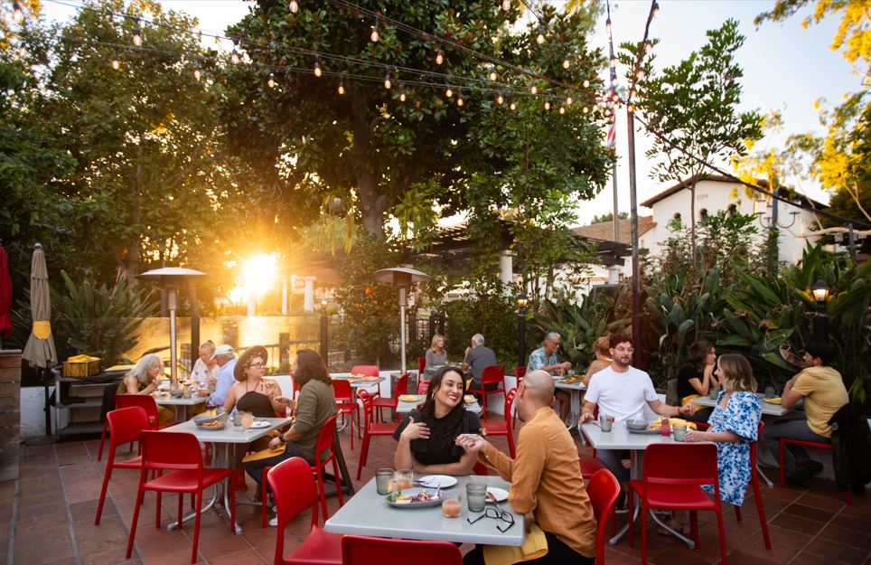 Dining at Luna Red with sun blaring through the trees