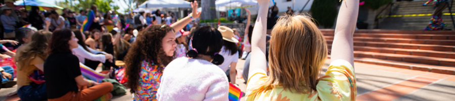 kids sitting for Pride in the Plaza