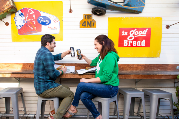 a couple enjoying a meal at a restaurant 