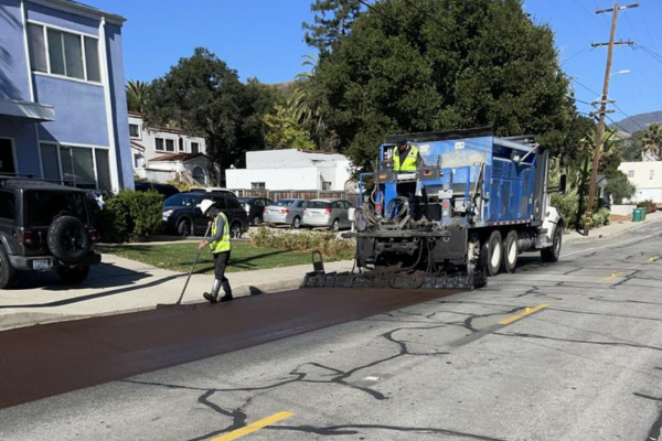 A picture of a construction crew doing slurry seal work on Ramona Drive in San Luis Obispo